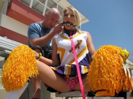 Blonde cheerleader Shawna Lenee is freed from ball gag to suck cock 98564788