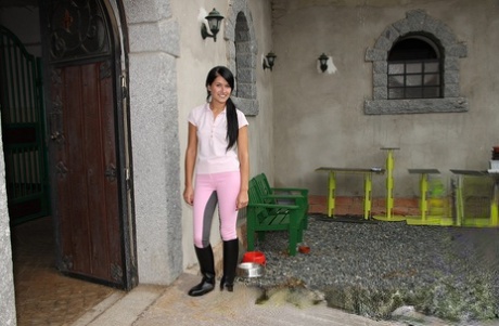 Barely legal girl pulls down riding pants to masturbate outside a horse stall 66759897