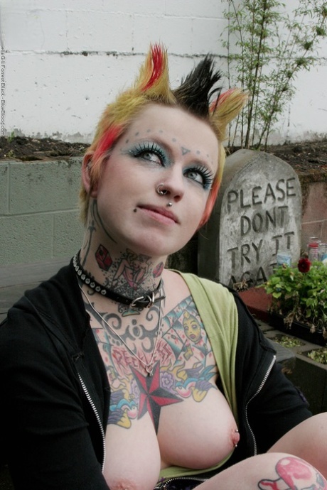 Tattooed alt chick Rachel Face exposes her private parts on a picnic table 59473127