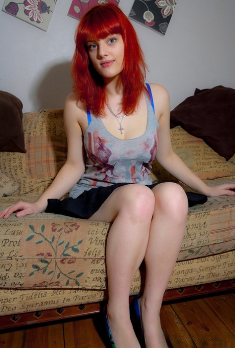 Redheaded teen Charlotte sets her big natural tits free in her underwear