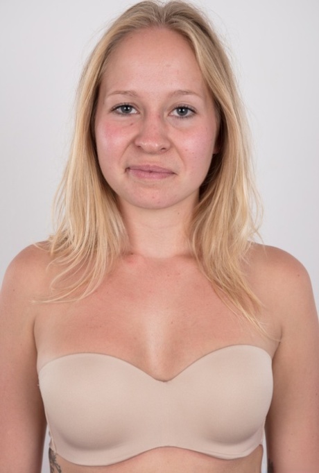 Blonde amateur Veronika exposes her tan lined tits in black underwear 61143099