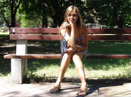 Cute young blonde in denim short skirt showing off her sexy pierced navel 65764577
