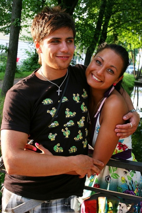 Amateur chick Jocelyn kisses her boyfriend while out for a walk in a park 80774724