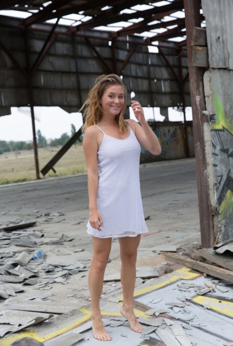 Teen solo girl Anel models totally naked amid ruins of abandoned building 71382920