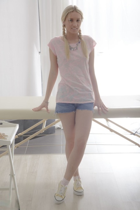 Young blonde girl gets rubbed down before being banged by her masseur 79323081