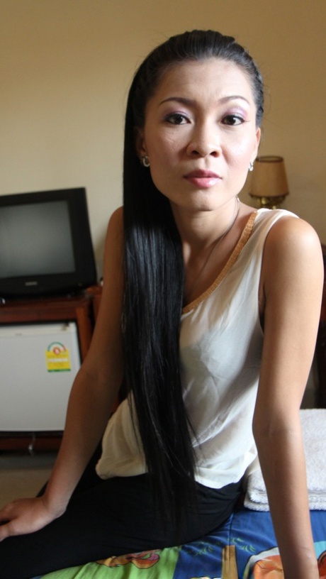 Slim Asian girl Gi sports a creampied beaver after POV sex with a Farang 38373361