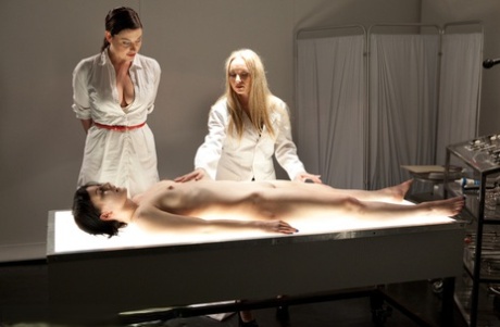 Female doctors use electrical devices when having lesbian sex with patients 78352682