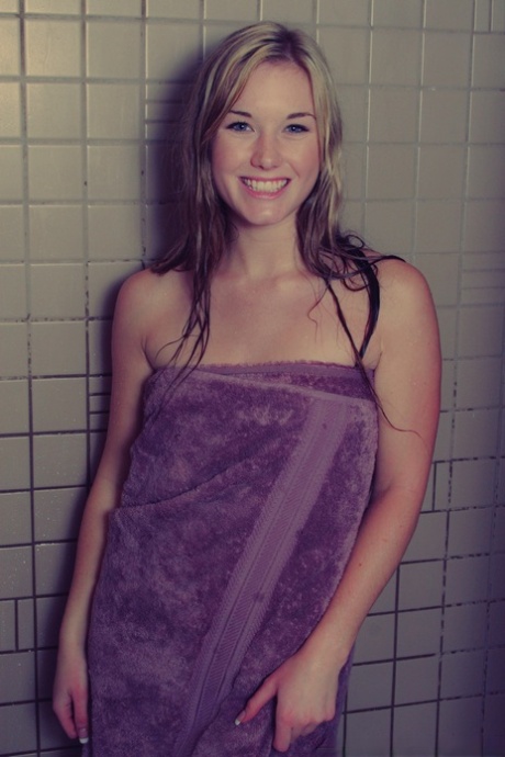Dirty blonde Jewel removes a bath towel to show her naked body in a shower 39170959