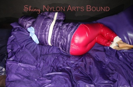 White girl is left tied up and gagged in nylon wear and a purple down jacket 58273994