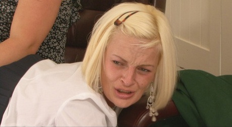 Blonde student receives a brutal paddling over her stepmother's knee 82531601