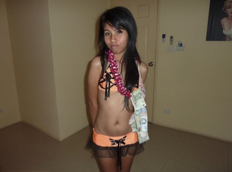 Petite Thai girl with an ass to die for takes an external cumshot after sex 81196467
