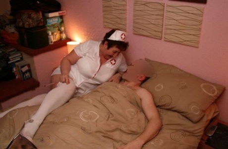 Mature amateur Kinky Carol gets on top of the man while wearing a nurse outfit