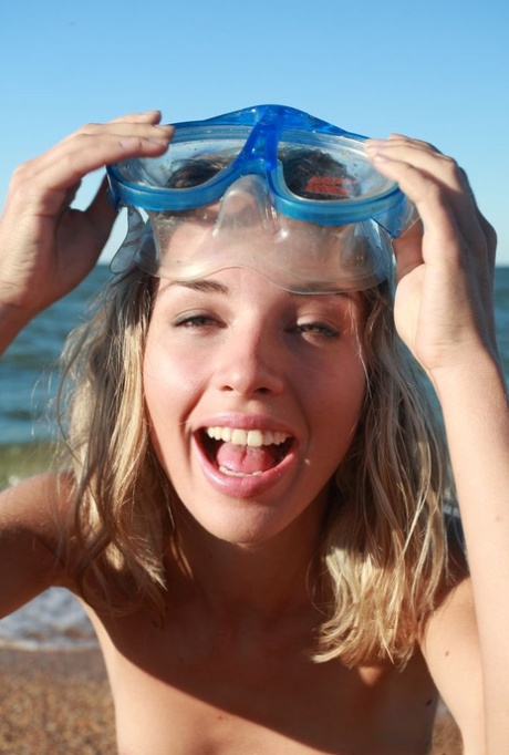 18-year-old blonde Nicole V poses nude on a beach in snorkeling gear 47859807