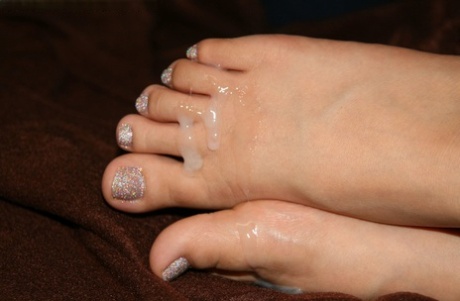 Caucasian girl displays her sperm covered feet and nothing else 80060852