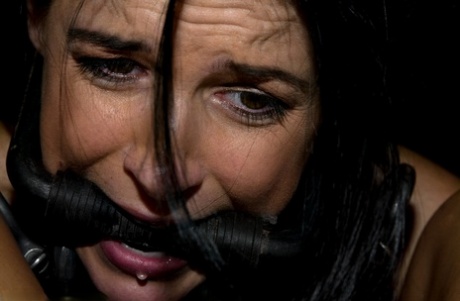 Brunette chick India Summer finds herself ball gagged while in bondage 11384301