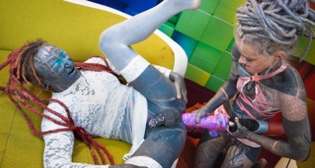 Heavily tattooed girl pegs a totally tattooed crossdressing sissy 98705260