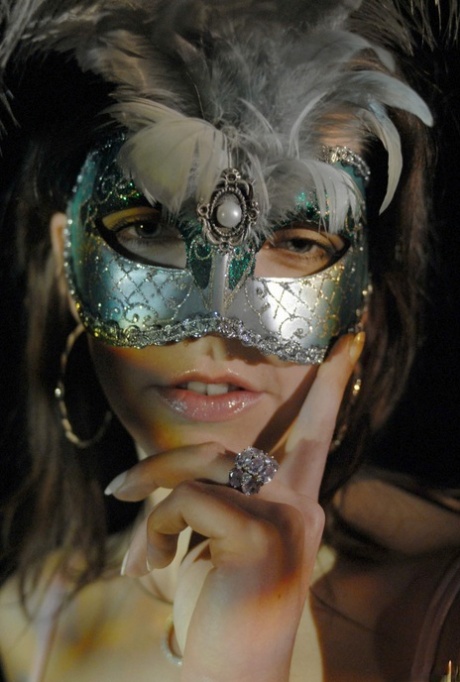 Caucasian solo model sports a masquerade mask while in her underthings 70927110