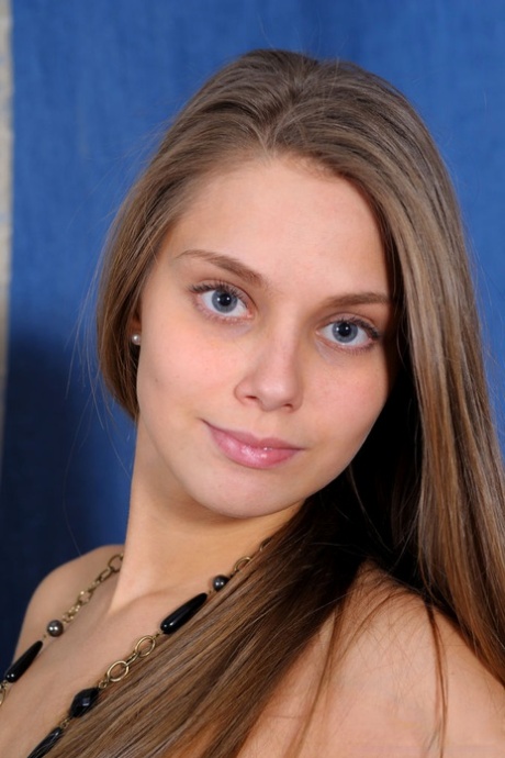 Barely legal beauty Kristel A models totally naked in a confident fashion 21533978