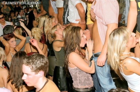 Drunk girls get on their knees to suck off guys during a crazy party 24250917