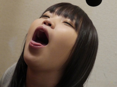 Japanese teen Riku Nekota gets a mouthful of cum while giving a blowjob 70279777
