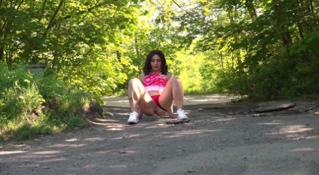Brunette chick Lola takes a piss while out for a walk in the countryside 61343809