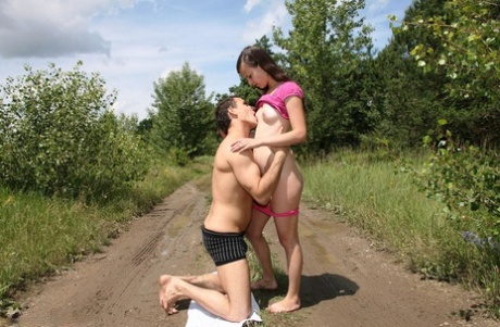 Brunette teen and her boyfriend fuck in the middle of a dirt road in the woods 76359161