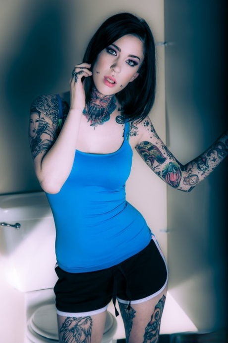 Brunette tattoo model revealing tiny tits and tight ass before masturbating 61930690