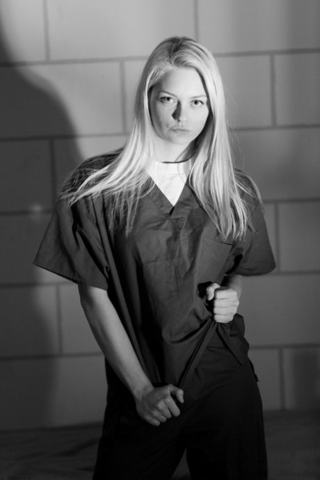 Blonde teen Alli Rae strips off prison garb to pose naked in her cell 96454516