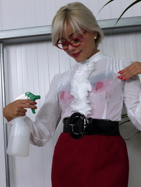 Nerdy Asian model Petra Lily So strips down to her nylons and garters 87724457