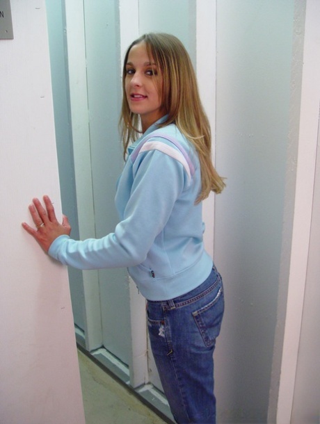Girl next door type Poppy Morgan sucks off a cock via washroom gloryhole
