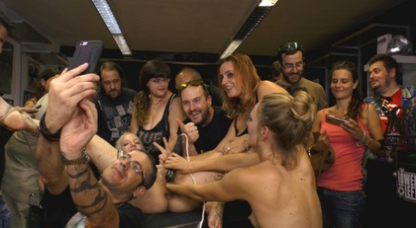 Blonde girl is humiliated in public before a public gangbang takes place 31989809