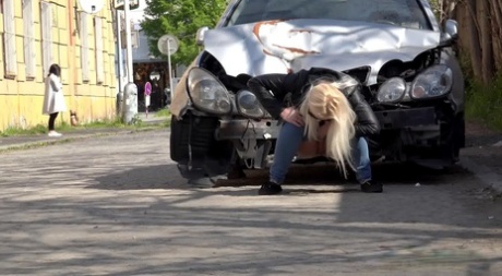 Blonde chick Morena squats afore a car for an urgent pee on a public road 34675968