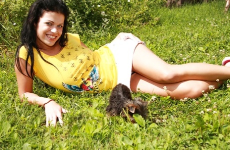 Smiling brunette with pretty face Ellis is having awesome time outdoor 55998527