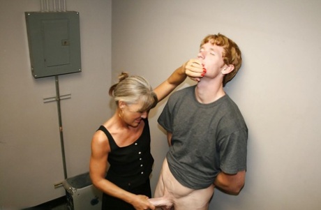 Naughty granny jerking off a big cock and getting a facial cumshot 17899363