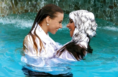 Nikky Thorne has some wet fully clothed pool fun with herfriend 68627688